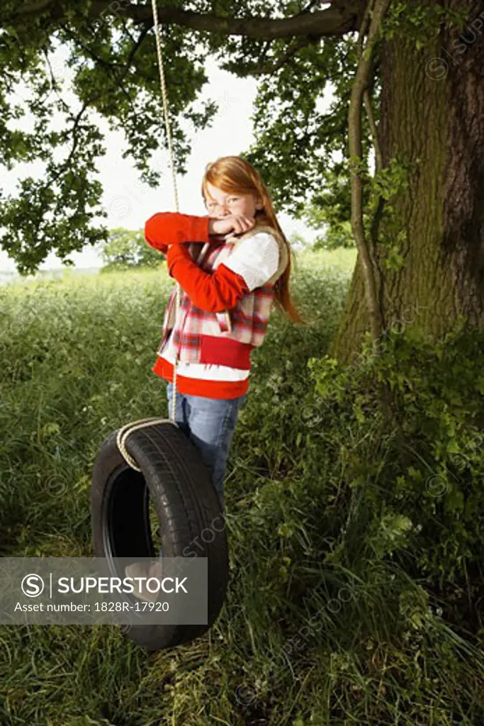 Girl on Tire Swing   