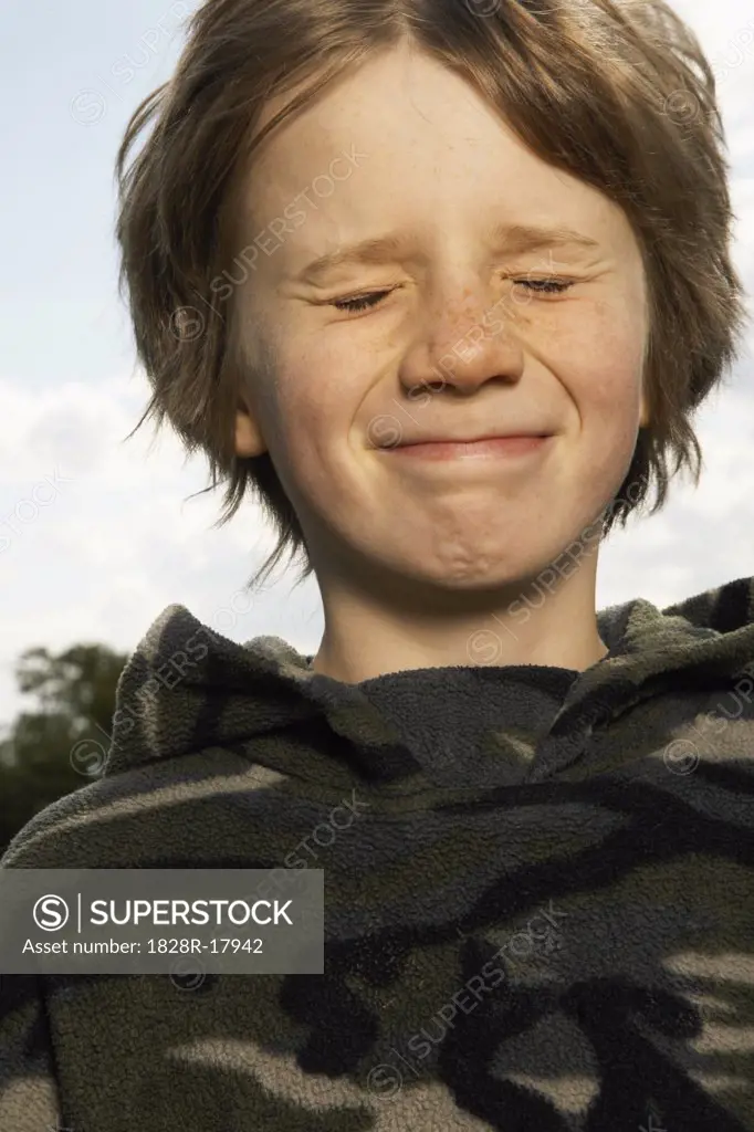 Portrait of Boy Making Faces   