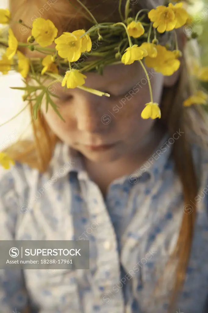 Portrait of Girl Wearing Crown of Wildflowers   
