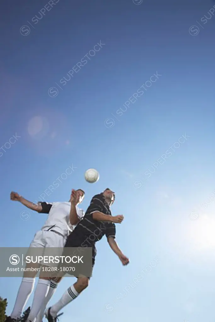 Men Playing Soccer   