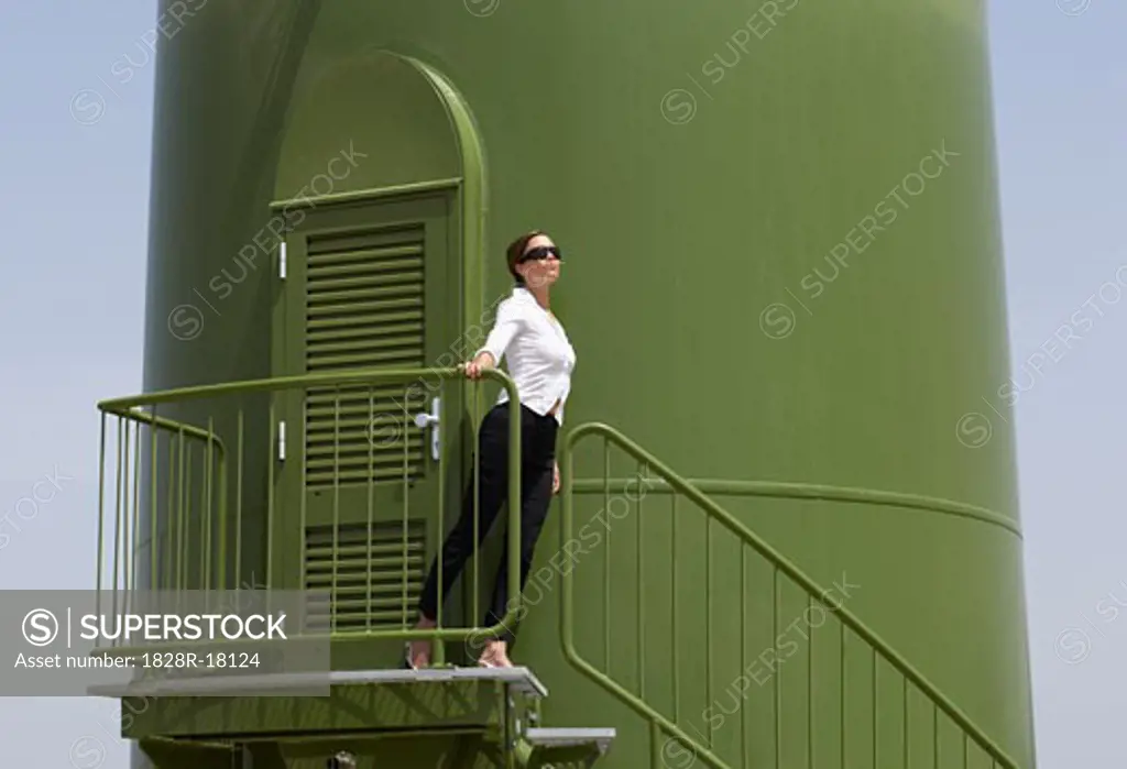 Woman on Wind Turbine Platform   
