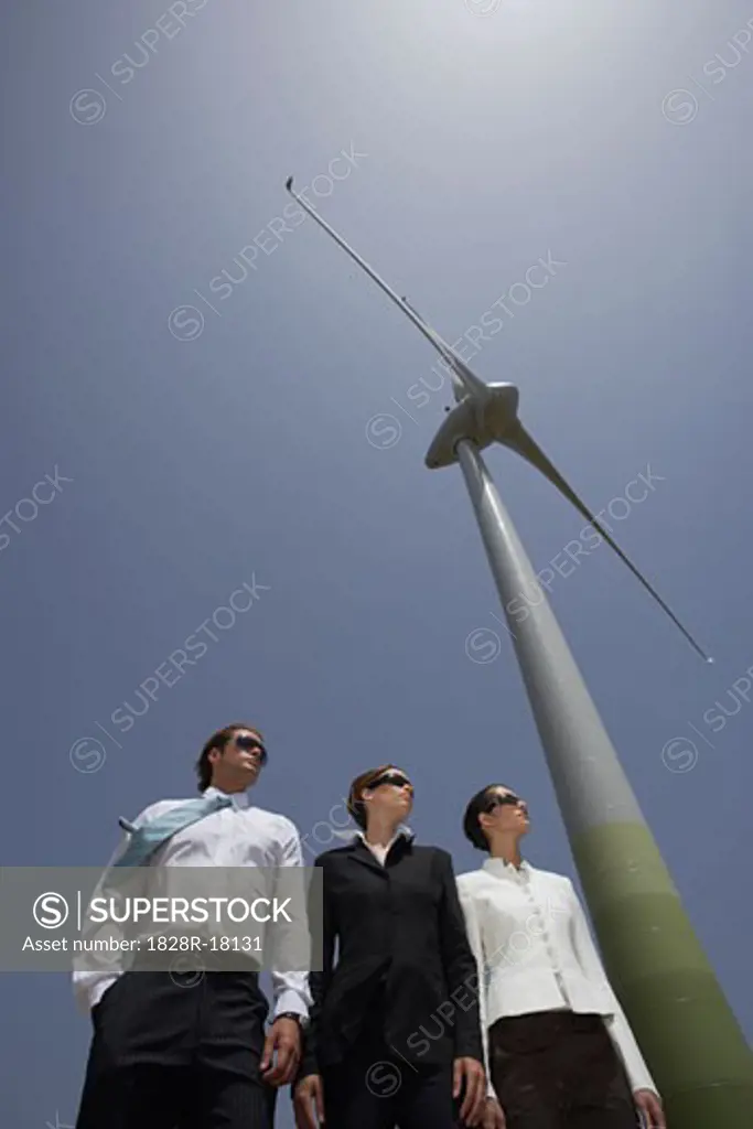 Business People by Wind Tower   