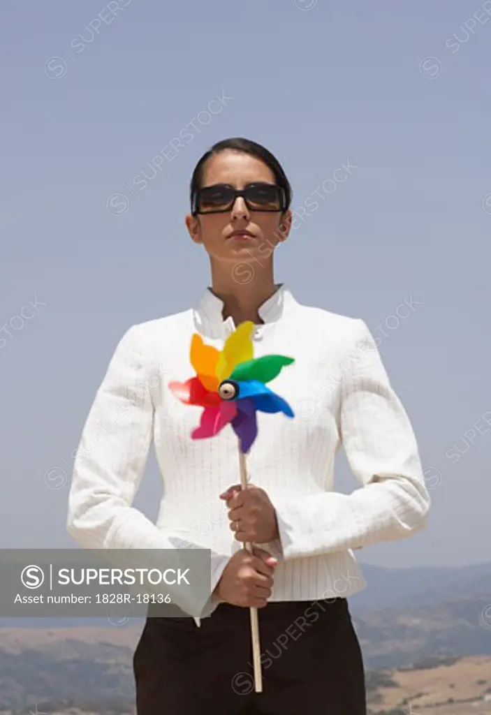 Business Woman holding Pinwheel   
