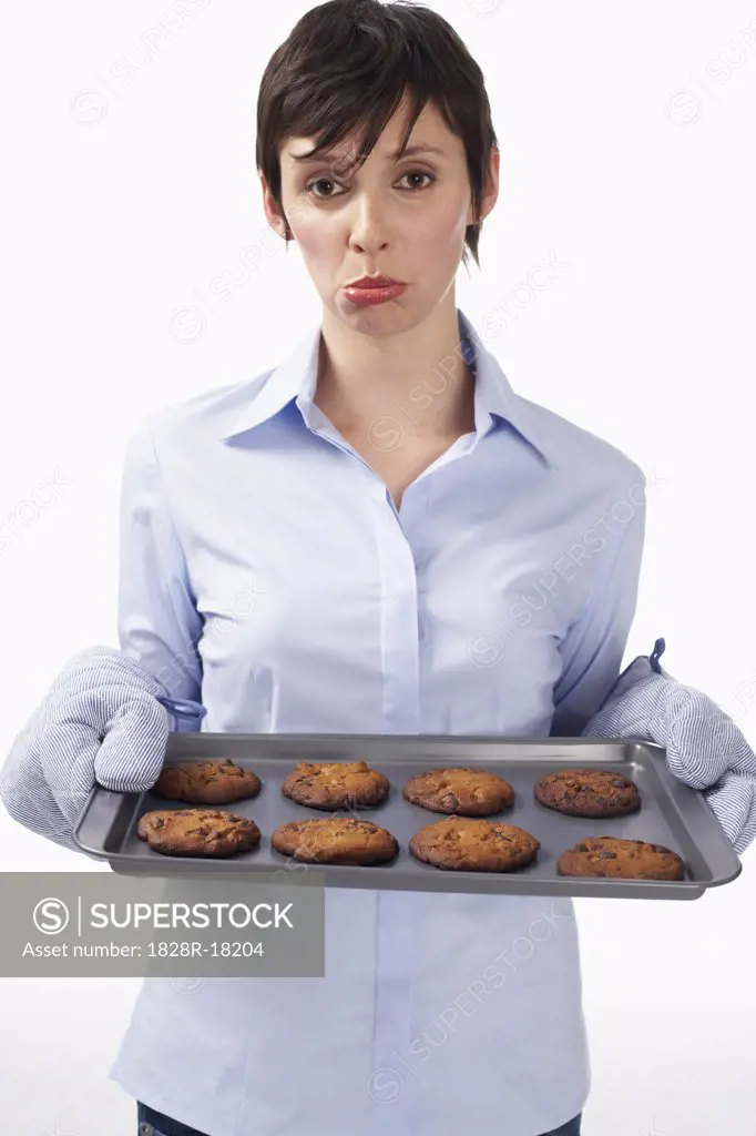 Woman Holding Burnt Cookies   
