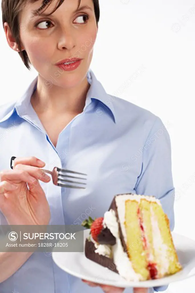 Woman Eating Cake   