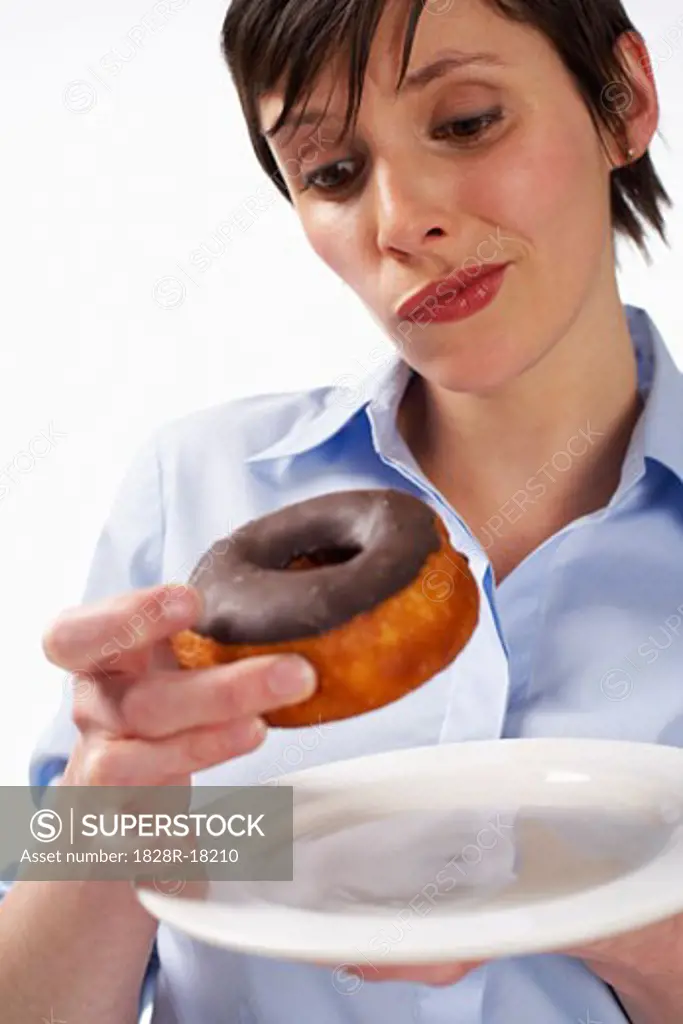 Woman Eating Doughnut   