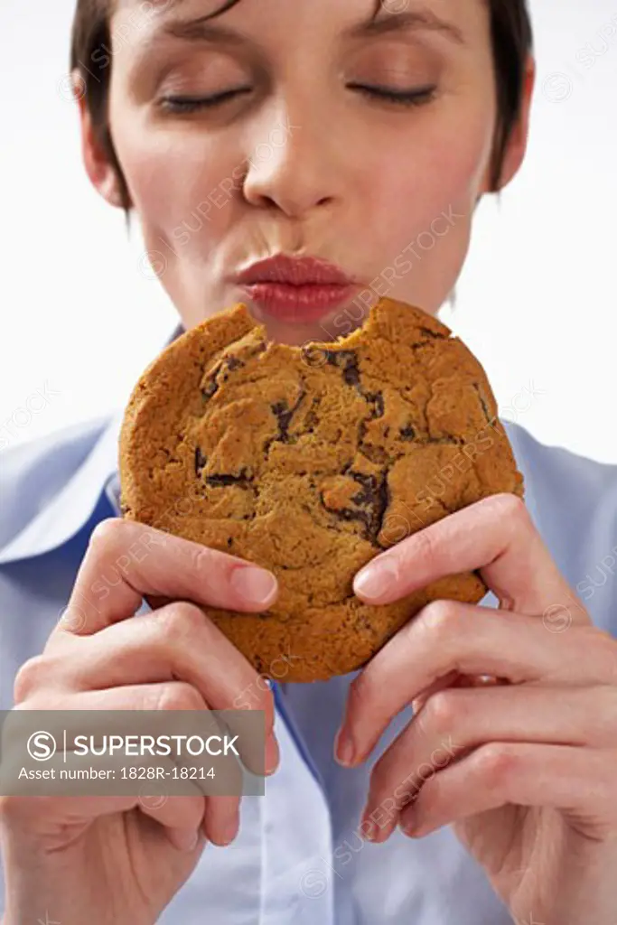 Woman Eating Cookie   