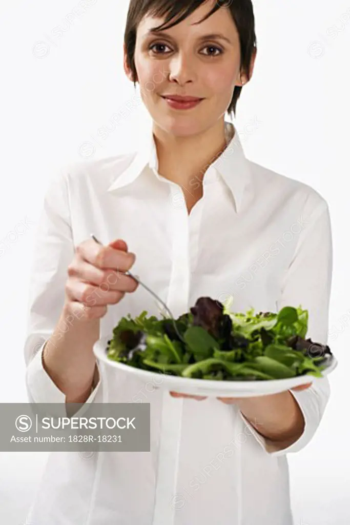 Woman Eating Salad   