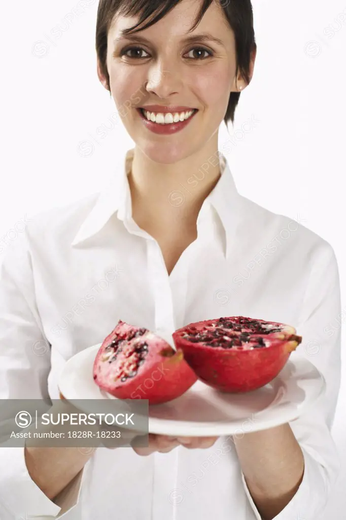 Woman Holding Pomegranate   