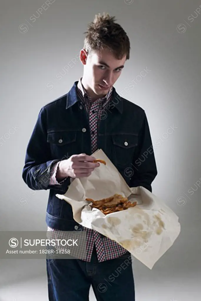 Man Eating Fish and Chips   