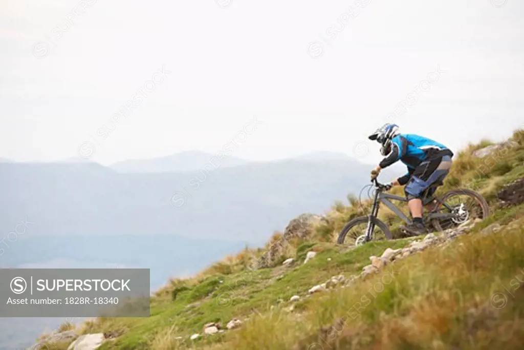 Man Mountain Biking down Hill, Aonach Mor, Scotland   