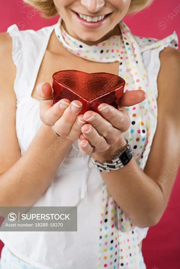 Woman Holding Heart-Shaped Box   