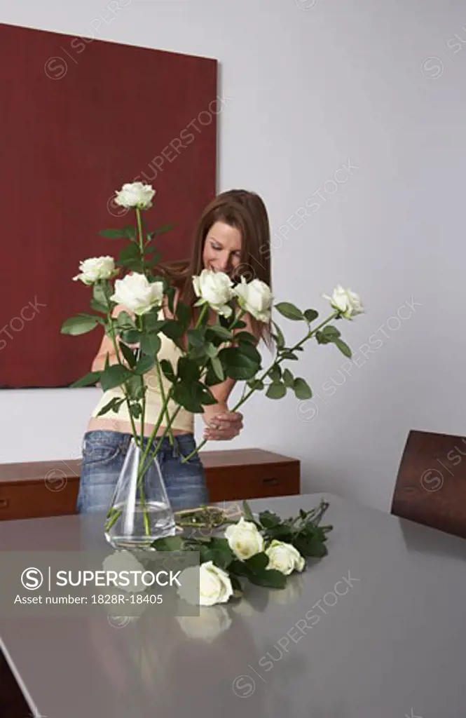 Woman Arranging Flowers   