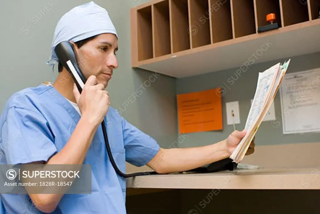 Doctor Talking on Telephone   