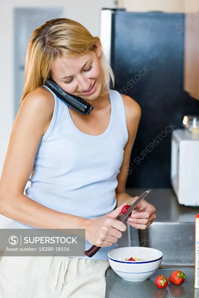 Woman Talking on Telephone   