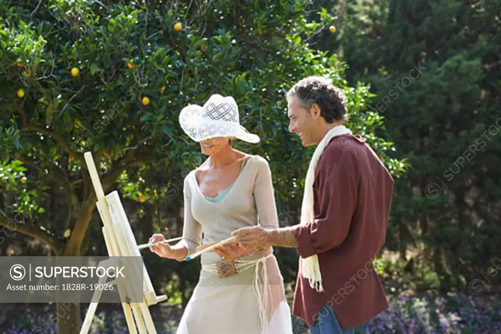 Couple Painting Together   