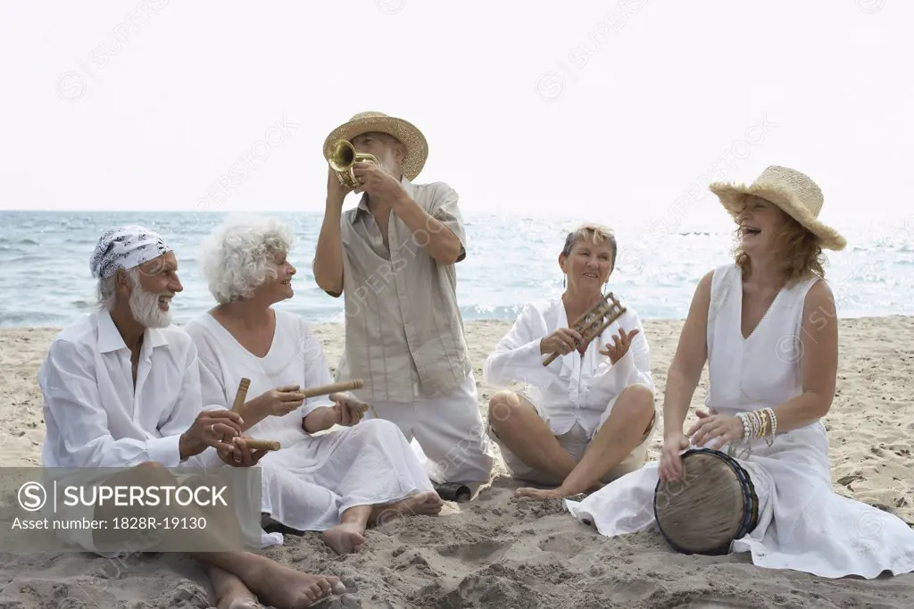 People Playing Music on Beach   