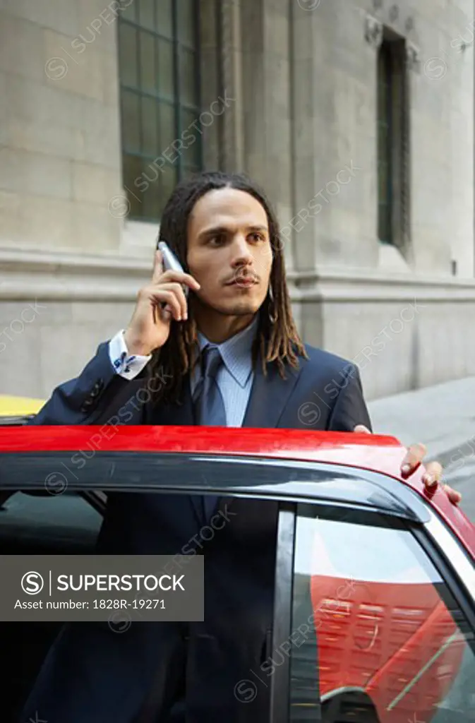 Businessman Using Cellular Phone   