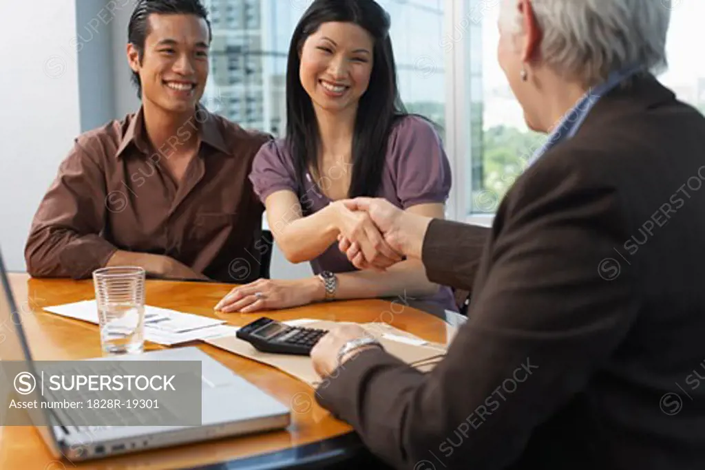 Couple Meeting with Financial Advisor   