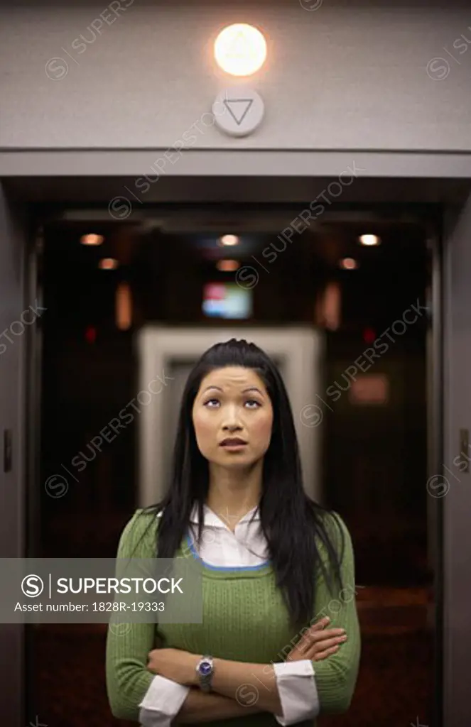 Woman in Front of Elevator   