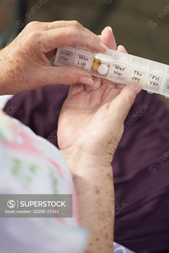 Woman Taking Pills   