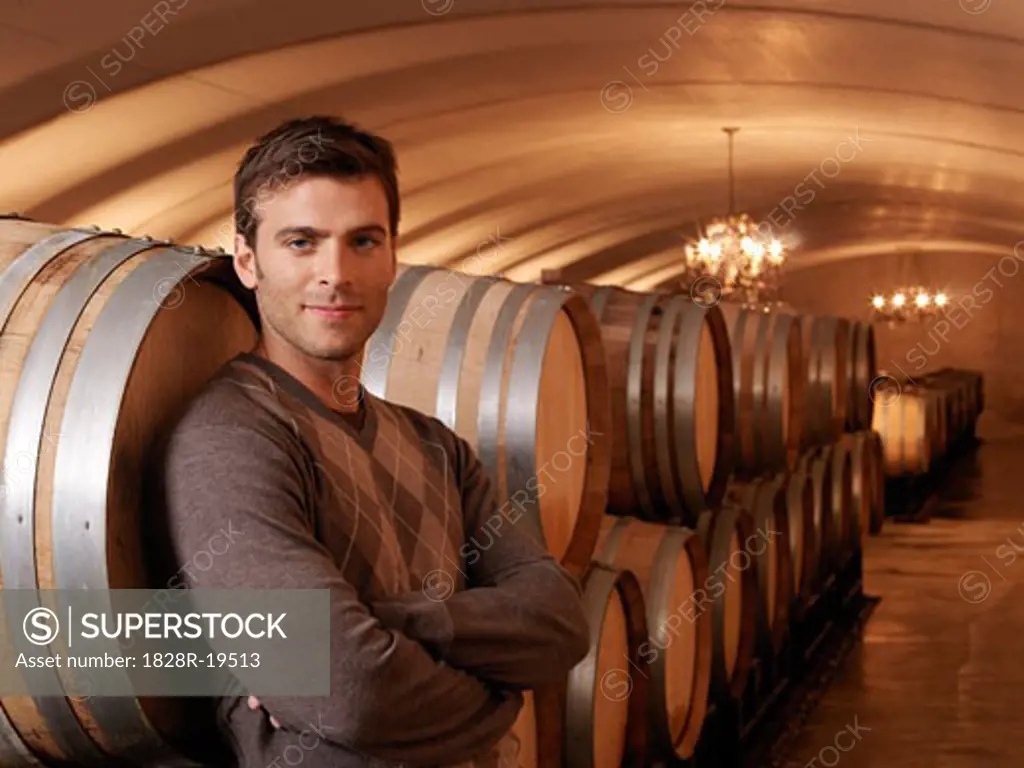 Man Standing in Wine Cellar   