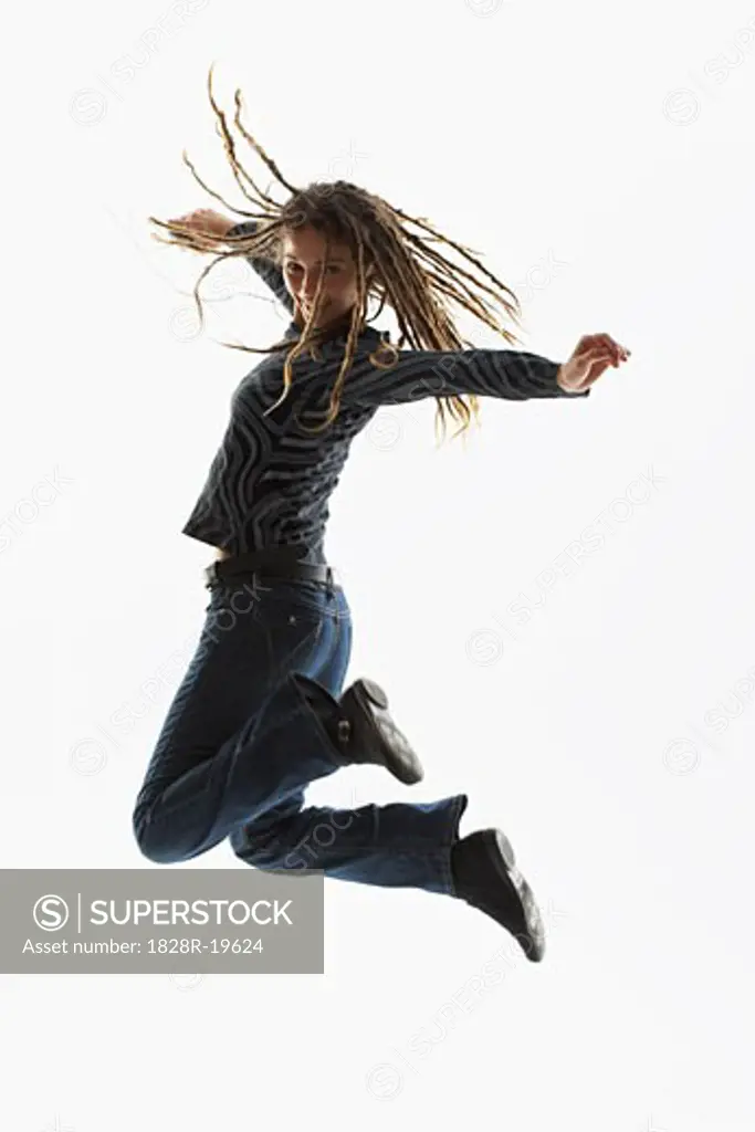 Woman Jumping, Using MP3 Player   