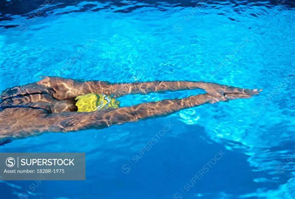 Woman Swimming in Pool   