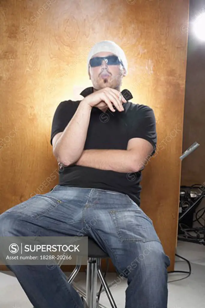 Man Smoking on Photo Set   