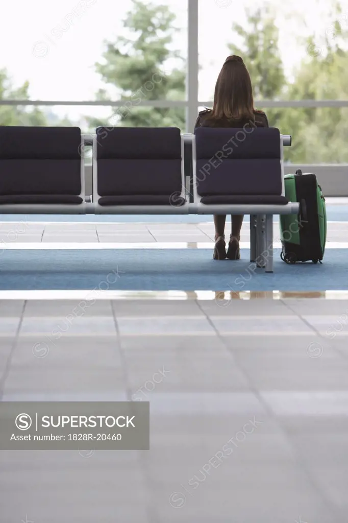 Woman in Airport Waiting Area   