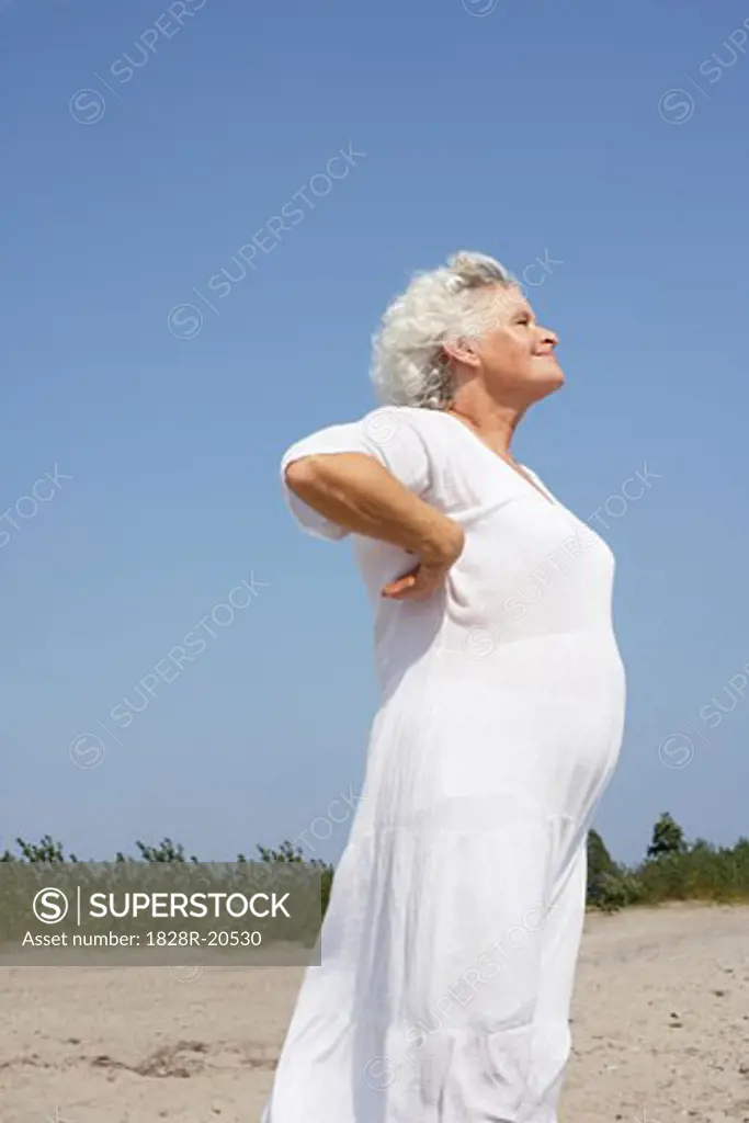Woman Standing on Beach