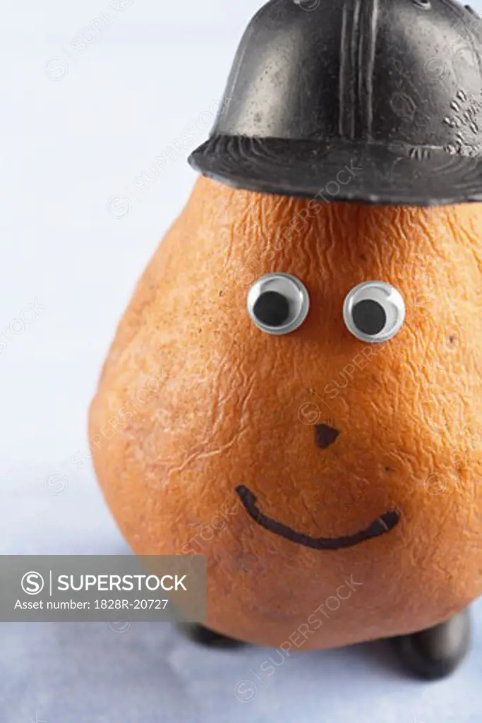 Pear Wearing Hat and Googly Eyes   