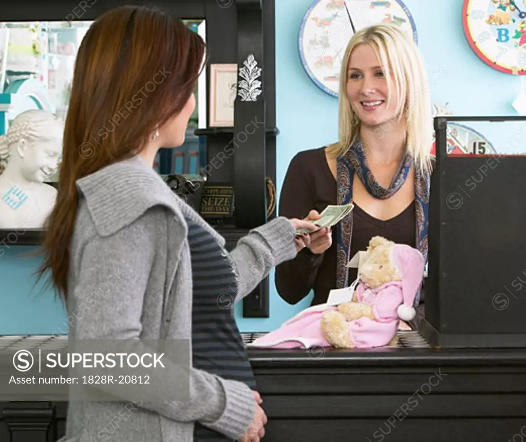 Pregnant Woman Shopping in Baby Store   