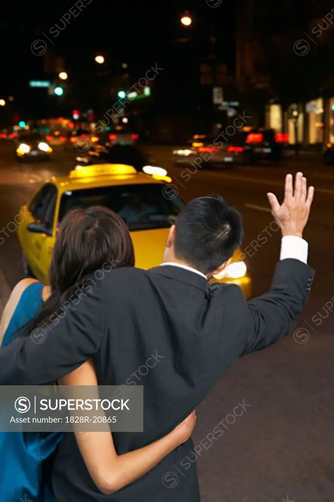 Couple Hailing Cab   