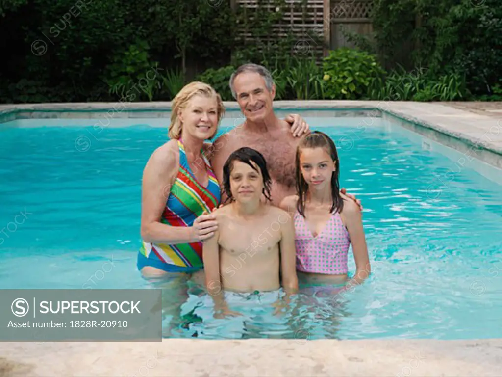 Family in Swimming Pool   