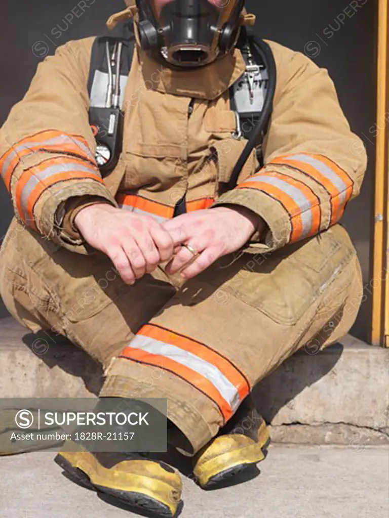 Firefighter Sitting in Doorway   