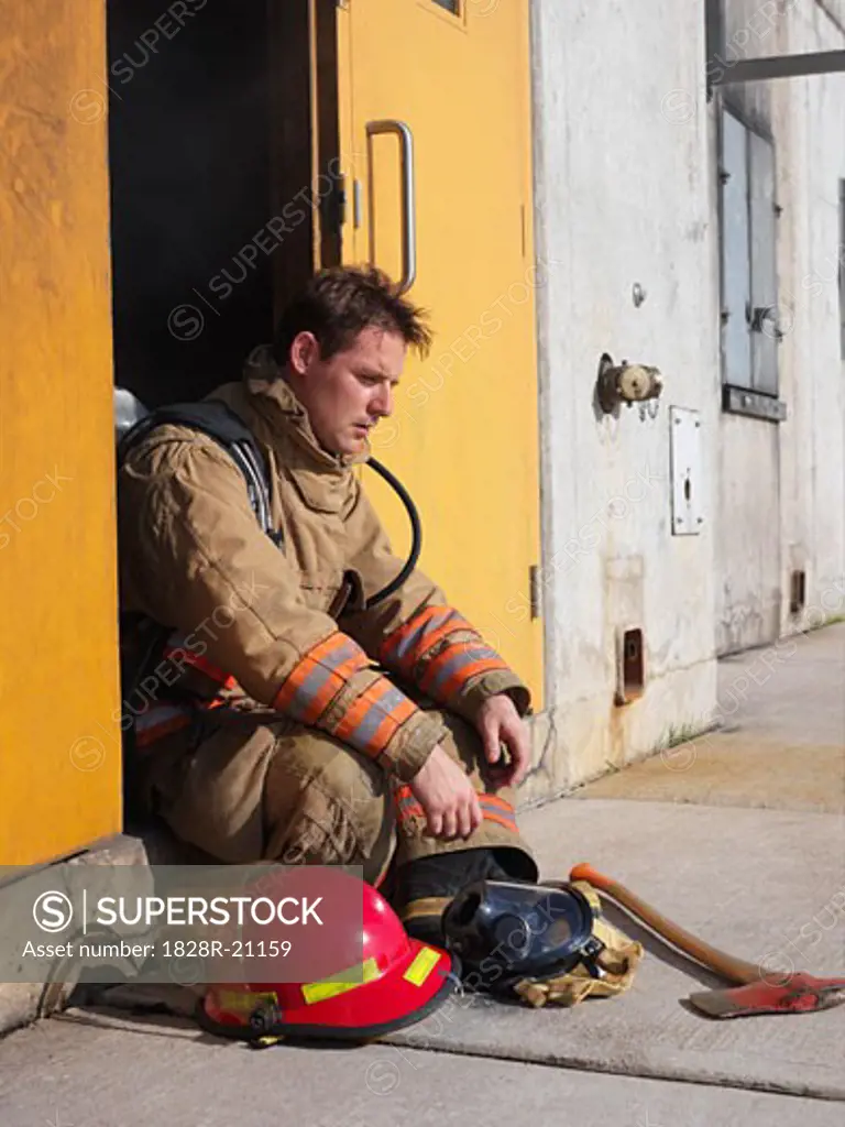 Firefighter Sitting in Doorway   