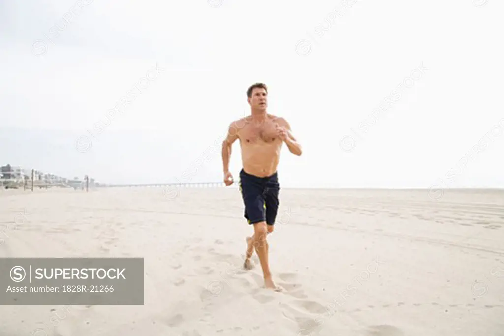 Man Running on Beach   