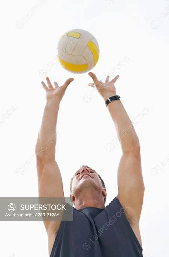 Man Playing Volleyball   