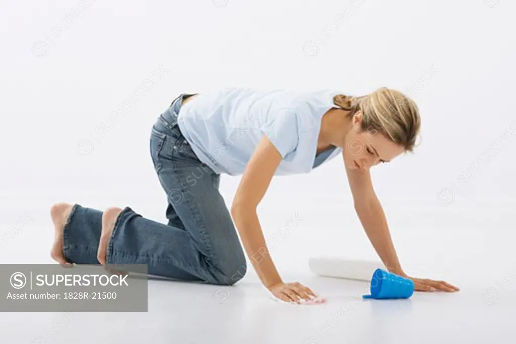 Woman Cleaning Floor   