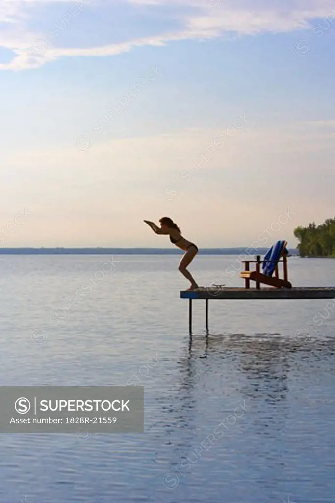 Woman Diving off of Dock   