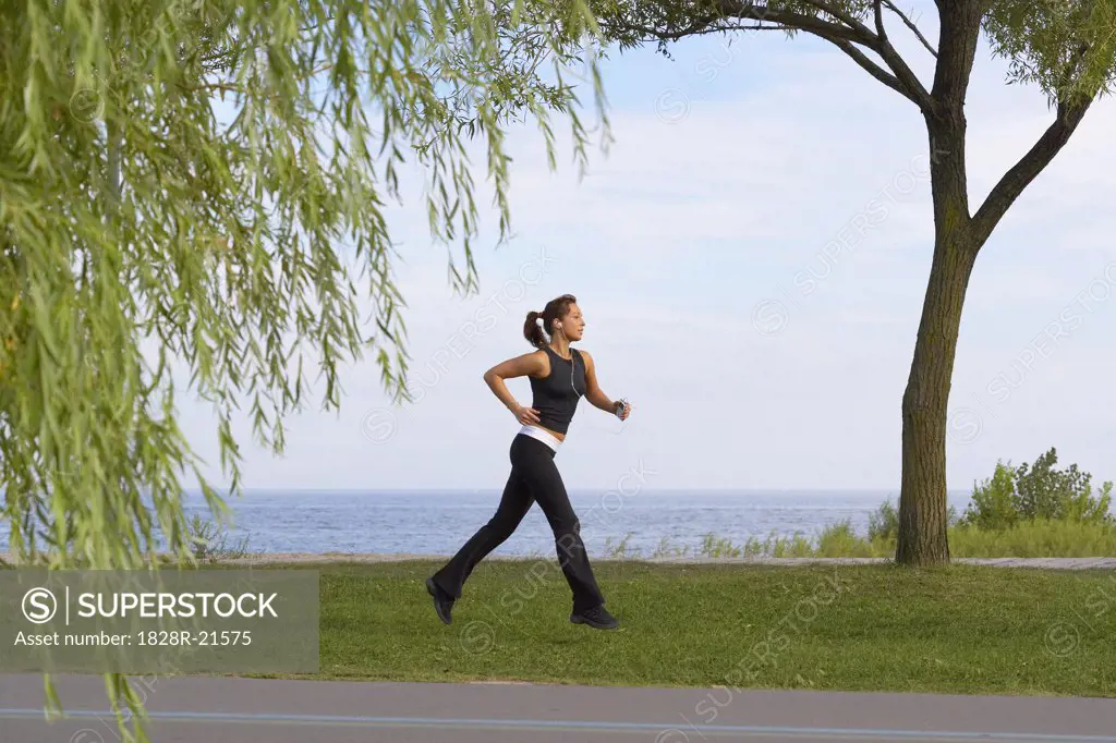 Woman Running in Park   