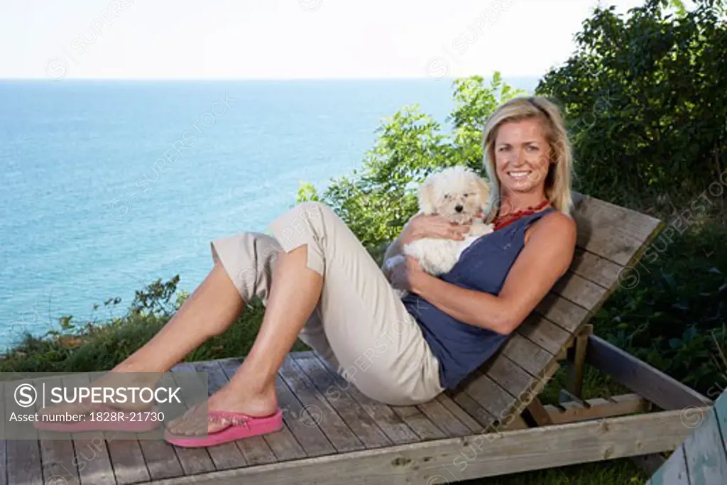 Portrait of Woman with Dog Outdoors   