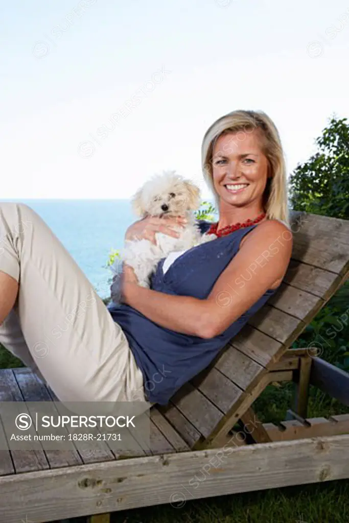 Portrait of Woman with Dog Outdoors   