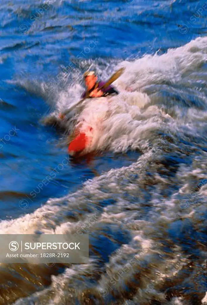 Man Kayaking Kern River, California, USA   