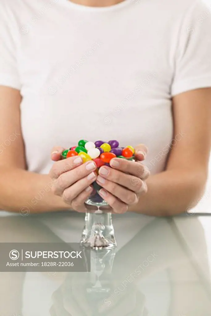 Woman Holding Bowl of Jelly Beans   