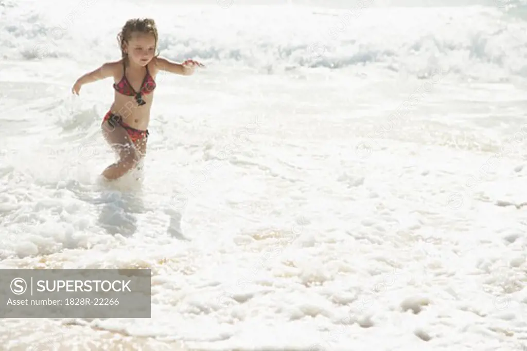 Little Girl Running on the Beach   