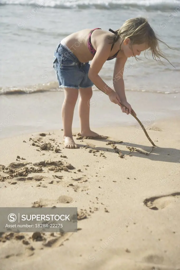 Little Girl Playing on the Beach   