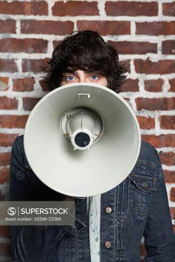Young Man Holding Megaphone   