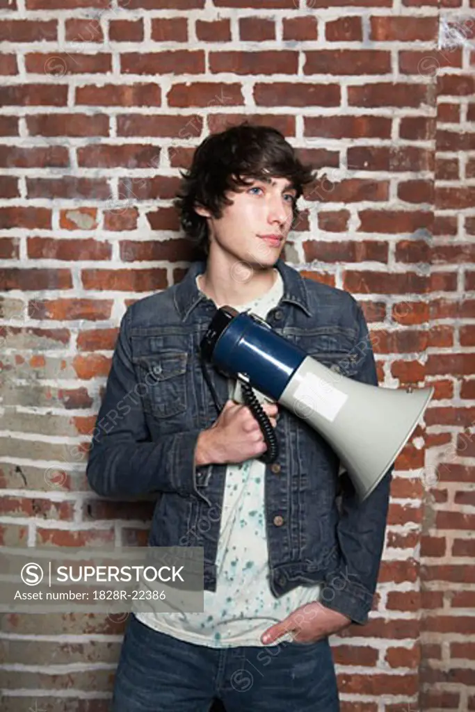 Young Man Holding Megaphone   